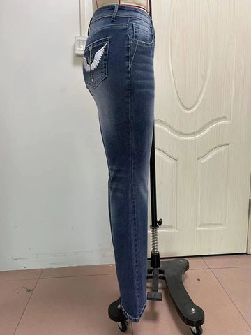 Women Embroidery Pockets Distressed Jeans Mid Waist Stretch Slim Fit Pants - American Thistle Women Embroidery Pockets Distressed Jeans Mid Waist Stretch Slim Fit Pants