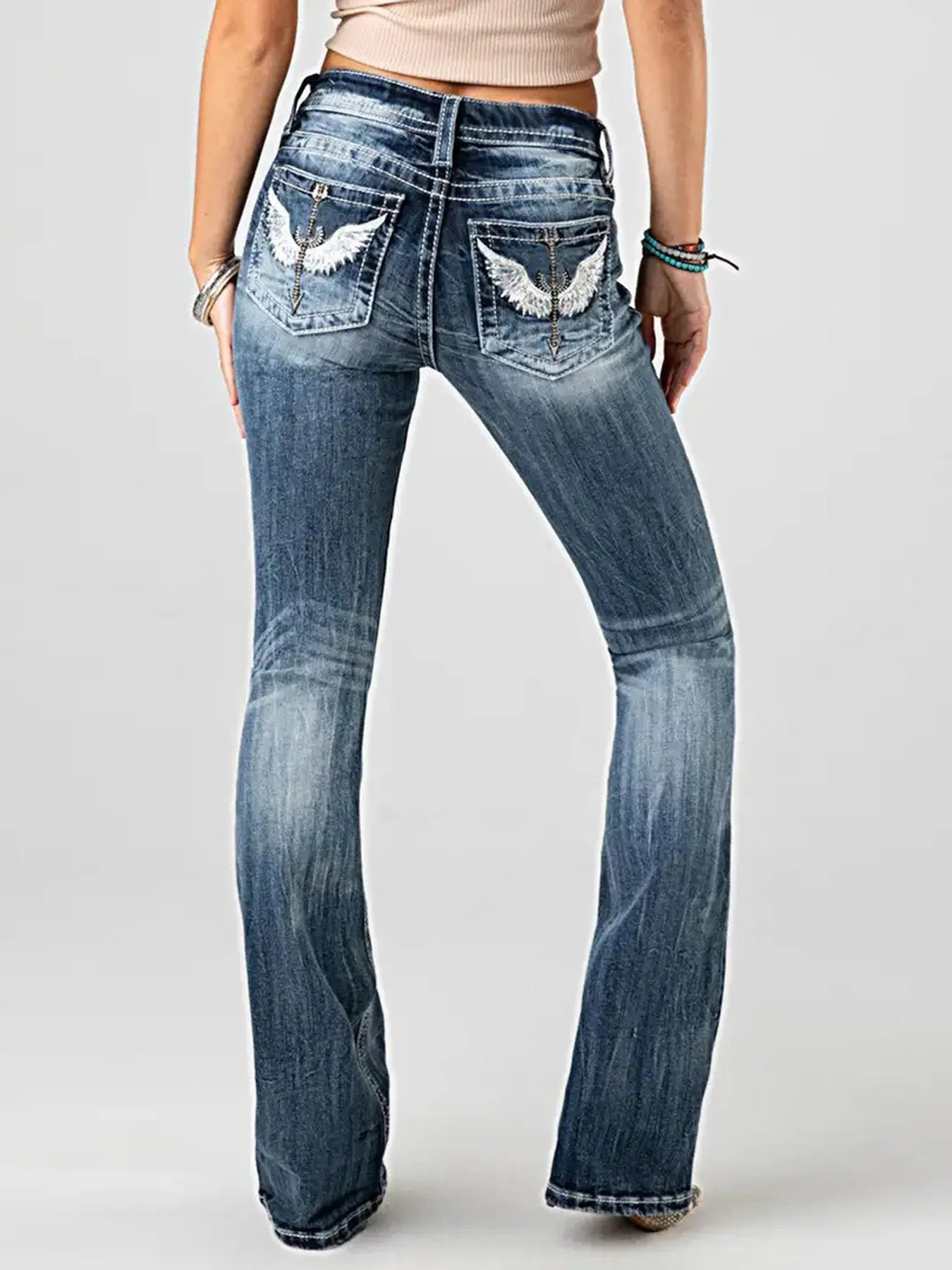 Women Embroidery Pockets Distressed Jeans Mid Waist Stretch Slim Fit Pants - American Thistle Women Embroidery Pockets Distressed Jeans Mid Waist Stretch Slim Fit Pants