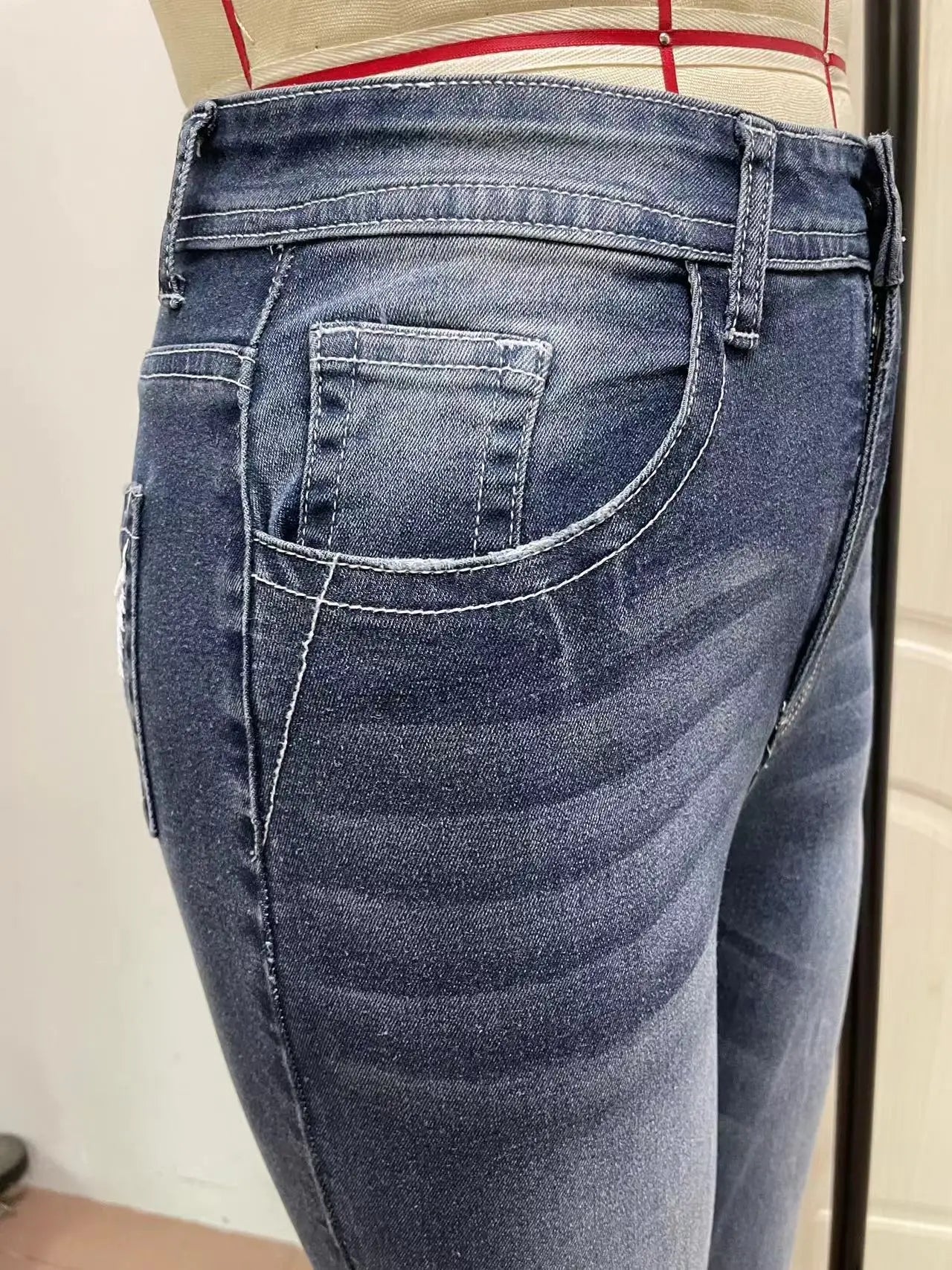 Women Embroidery Pockets Distressed Jeans Mid Waist Stretch Slim Fit Pants - American Thistle Women Embroidery Pockets Distressed Jeans Mid Waist Stretch Slim Fit Pants